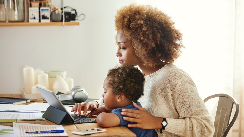 woman and son on tablet