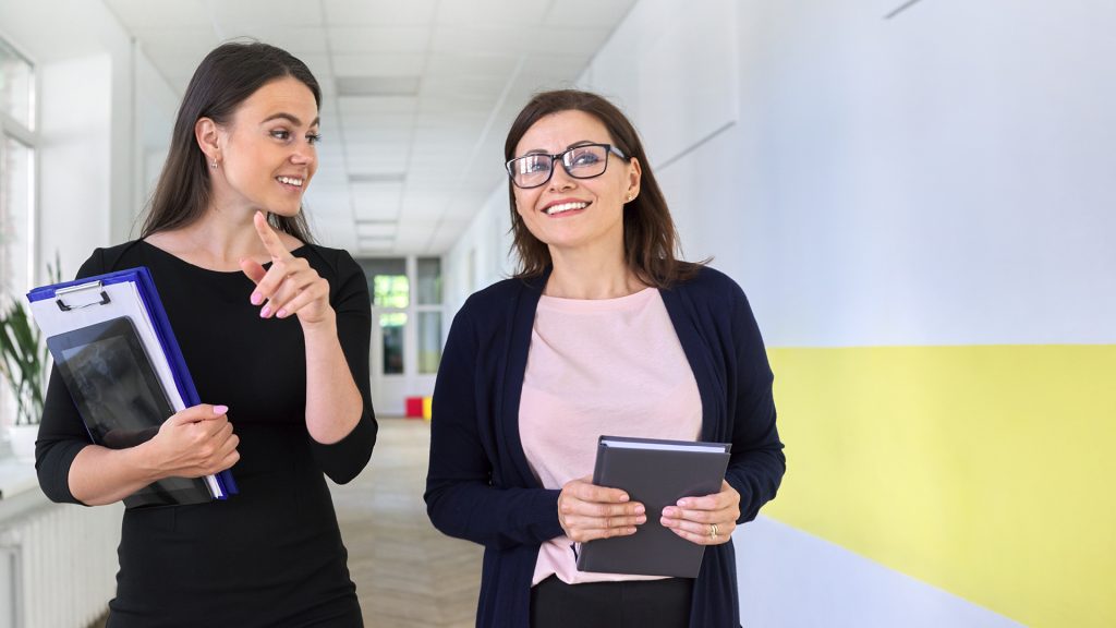 2 women in hallway