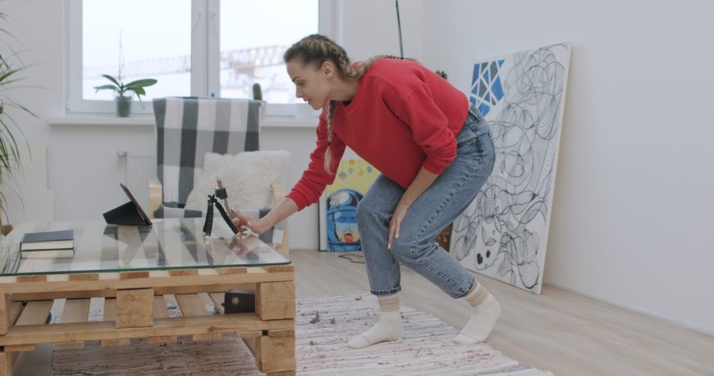 woman making tik tok video
