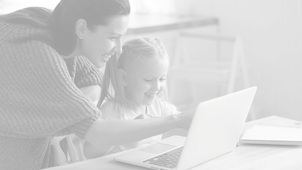 mom with daughter on laptop
